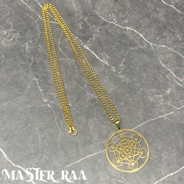 Sacred Geometry pendant in gold finish laid flat – symbol of cosmic harmony