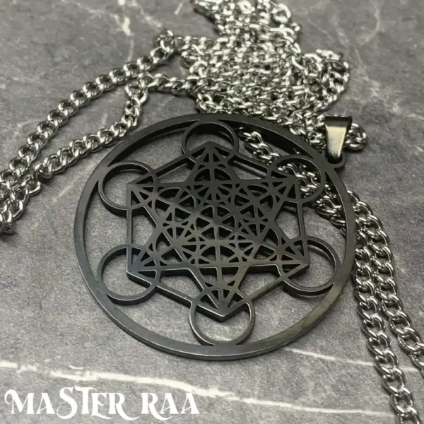 Close-up view of a sacred geometry pendant in gun metal finish showing fine detail