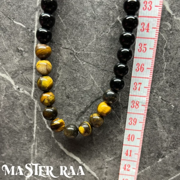 Tigers Eye & Onyx Beaded Necklace Held Next To A Ruler For Length View