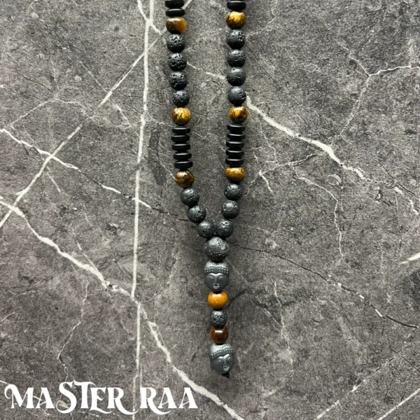 Tigers Eye & Volcanic Rock Buddha Pendant Necklace close-up view showing crystal detail
