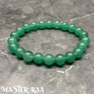 Green Aventurine crystal bracelet with polished green beads, laid flat on white background