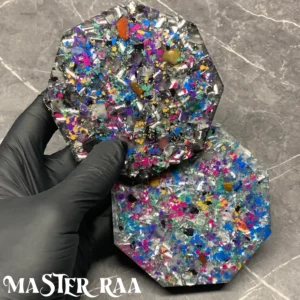 Alternate angle of the Yin Yang octagon orgone coaster set, displaying metallic layers and radiant colour effects.