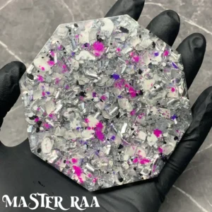 Close-up of the Octagon Orgone Coaster designed for sleep and serenity, featuring calming lavender and pink tones.